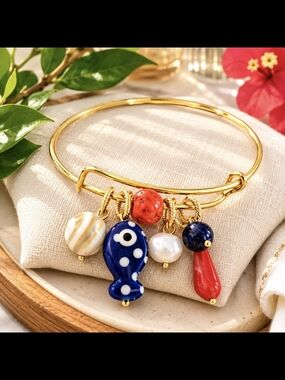 Gold Charm Bangle Bracelet with Blue ceramic  Fish and Multicolor Charms